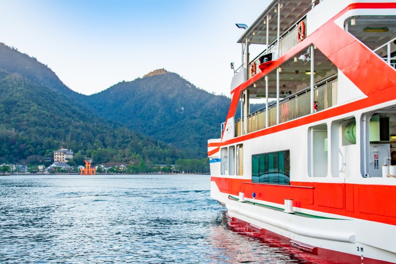 Hiroshima & Miyajima Tour - The View At Miyajima Ferry Terminal In Miyajima Island, Hatsukaichi City, Hiroshima Pref. Japan. We Can See The Great Torii Of Itsukushima Shrine Across The Sea.