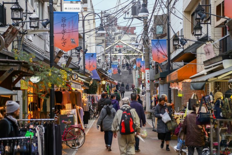 Crowds Walking Through The Busy Yanaka District In Tokyo